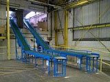 Mezzanine inter-floor conveyors for loading bay