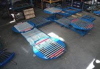 Pallet handling system with turntables and scissor lift tables
